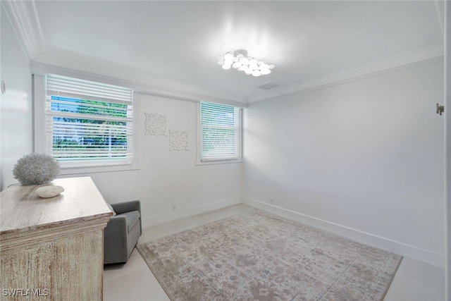 sitting room featuring crown molding