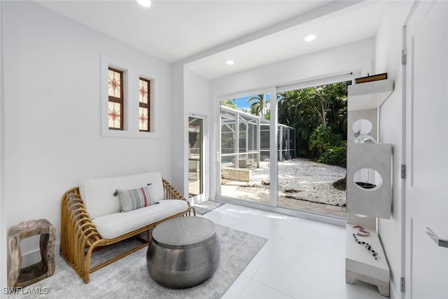 living area featuring light tile patterned flooring