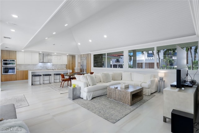 living room with vaulted ceiling