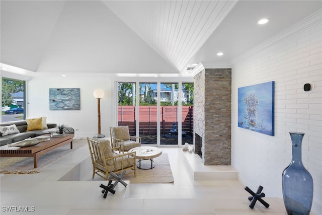 tiled living room with high vaulted ceiling