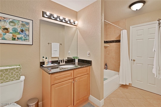 full bathroom with tile patterned floors, vanity, a textured ceiling, shower / bath combo, and toilet