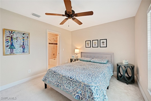 carpeted bedroom featuring ceiling fan, a closet, and a spacious closet