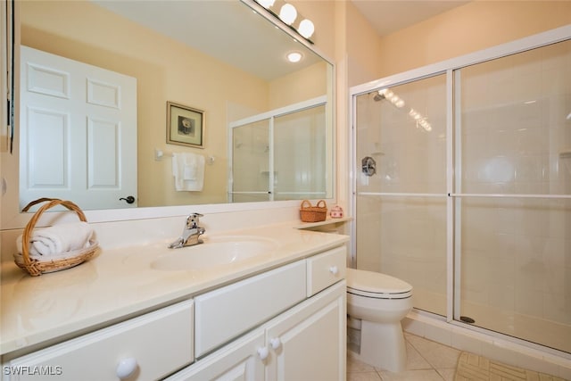 bathroom featuring walk in shower, tile patterned flooring, vanity, and toilet