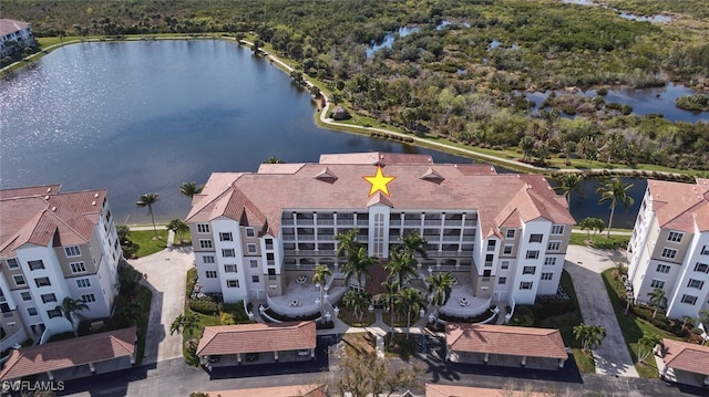 bird's eye view with a water view