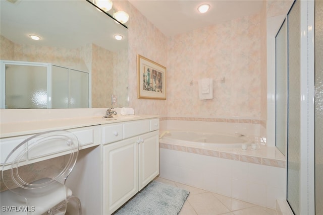 bathroom with vanity, tile patterned flooring, and shower with separate bathtub