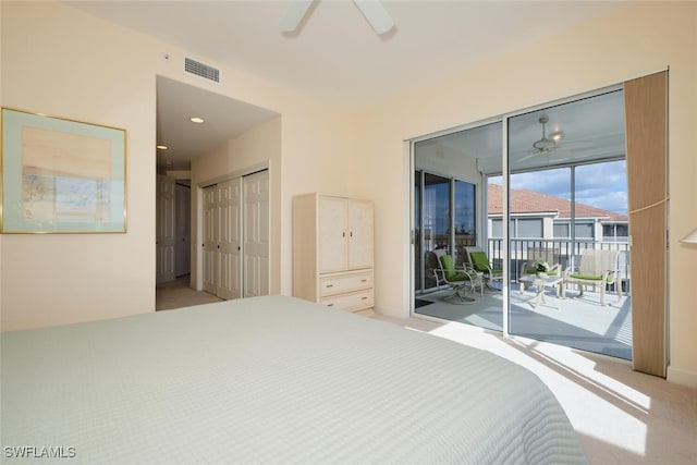 carpeted bedroom with ceiling fan, a closet, and access to outside