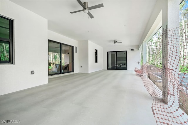 view of patio / terrace featuring ceiling fan