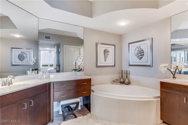 bathroom featuring vanity, a wealth of natural light, tile patterned floors, and independent shower and bath