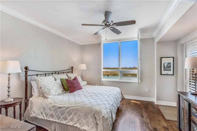 bedroom featuring ceiling fan, crown molding, and dark hardwood / wood-style flooring