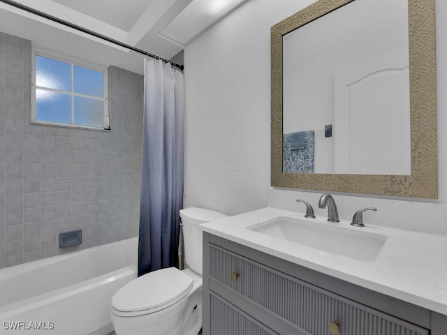 full bathroom featuring shower / tub combo with curtain, vanity, and toilet