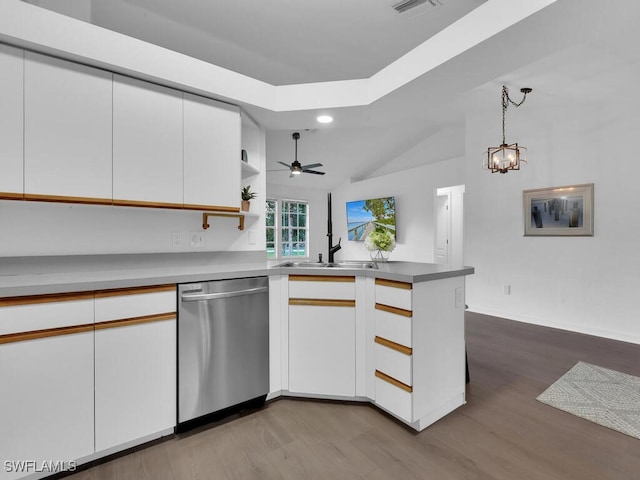 kitchen featuring dishwasher, kitchen peninsula, white cabinetry, and hanging light fixtures