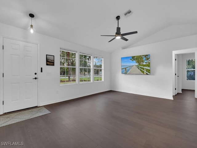 foyer with ceiling fan, dark wood-type flooring, and lofted ceiling