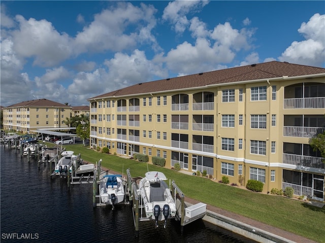 view of property with a water view