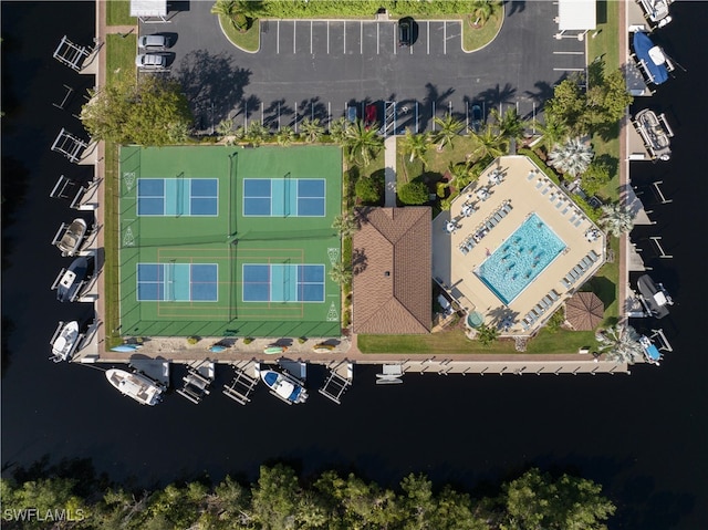 birds eye view of property featuring a water view