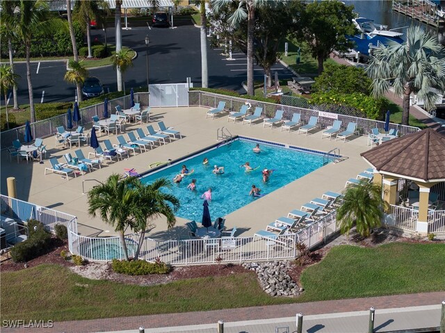 view of swimming pool with a patio area