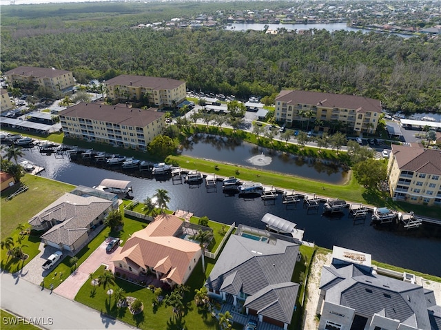 bird's eye view with a water view