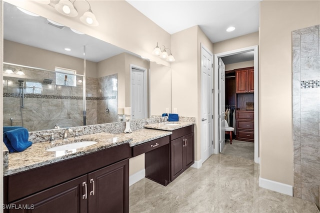 2616 Malaita Ct, Cape Coral, FL 33991 - bathroom featuring a tile shower and vanity