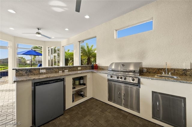 2616 Malaita Ct, Cape Coral, FL 33991 - view of patio with a grill, ceiling fan, and sink