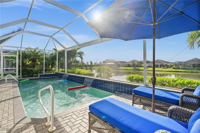 2616 Malaita Ct, Cape Coral, FL 33991 - view of swimming pool with pool water feature, a lanai, a patio area, and a water view