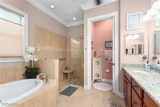 bathroom featuring shower with separate bathtub, vanity, tile patterned floors, and crown molding