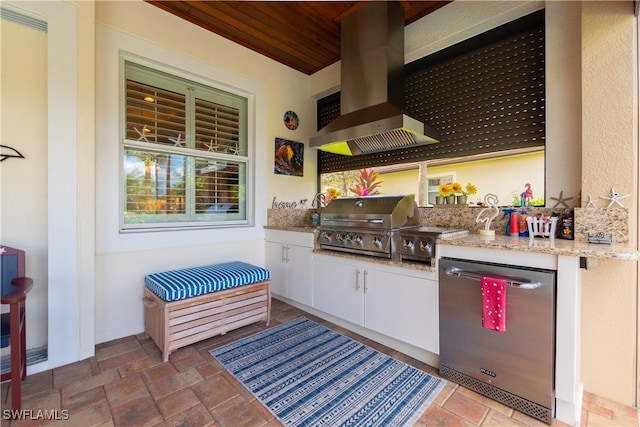 view of patio / terrace featuring an outdoor kitchen, sink, and grilling area