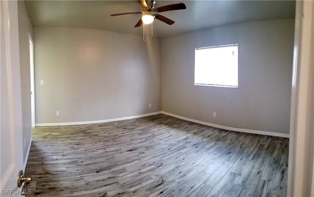 empty room with light hardwood / wood-style flooring and ceiling fan