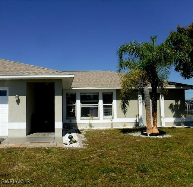 exterior space with a yard