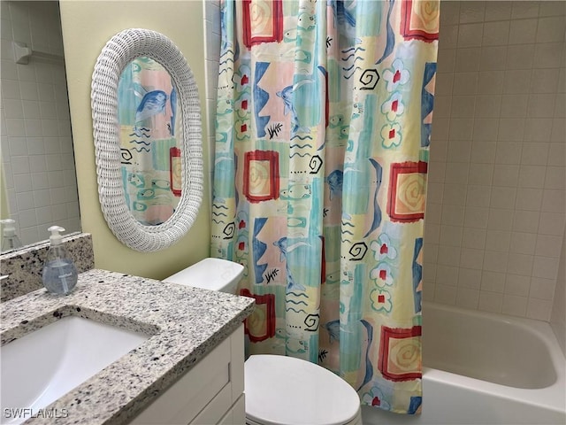 full bathroom featuring vanity, toilet, and shower / bath combo