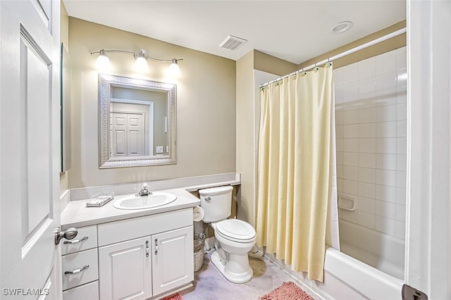 full bathroom featuring shower / tub combo with curtain, vanity, and toilet