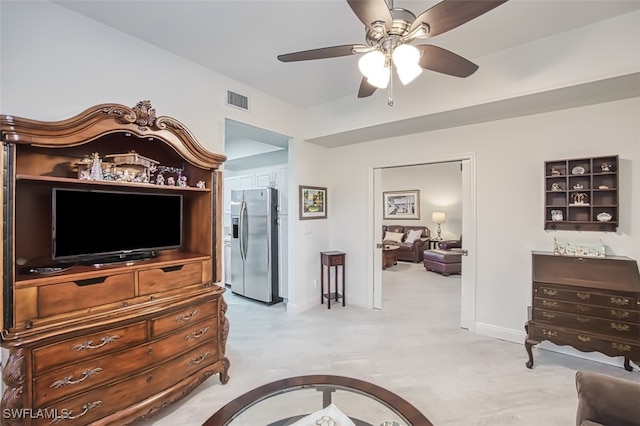 interior space featuring ceiling fan