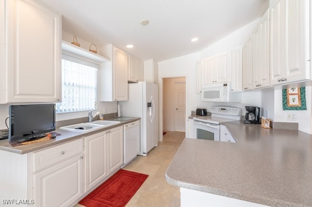 kitchen with white cabinetry, sink, kitchen peninsula, white appliances, and light tile patterned flooring