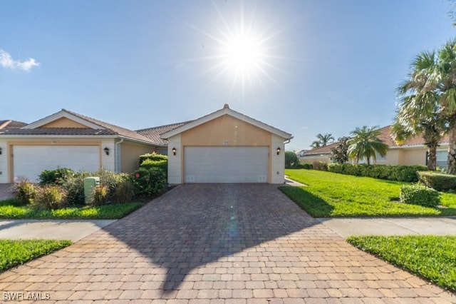 single story home featuring a garage