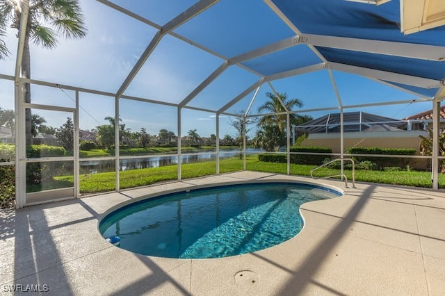 view of pool featuring a lanai, a water view, and a patio