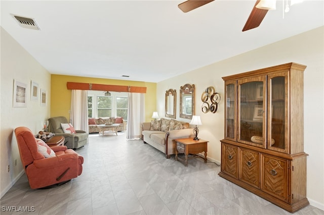 living room with ceiling fan