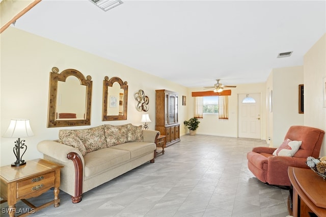 living room with ceiling fan