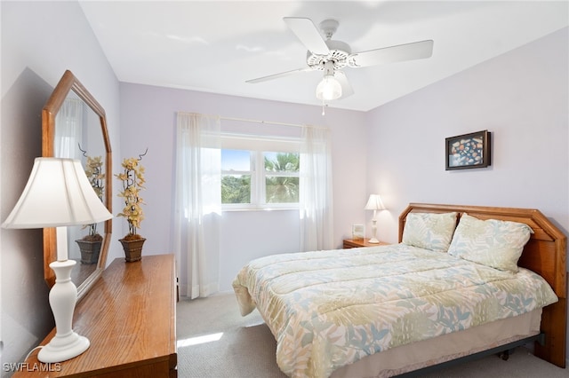 bedroom featuring ceiling fan and carpet flooring