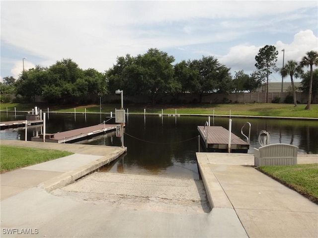 view of dock with a water view