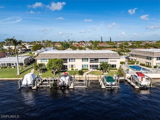 4231 SE 19th Pl Unit 1J, Cape Coral, FL 33904 - dock area featuring boat lift and a water view