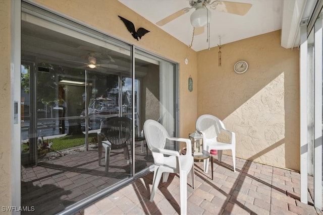 4231 SE 19th Pl Unit 1J, Cape Coral, FL 33904 - sunroom featuring a ceiling fan