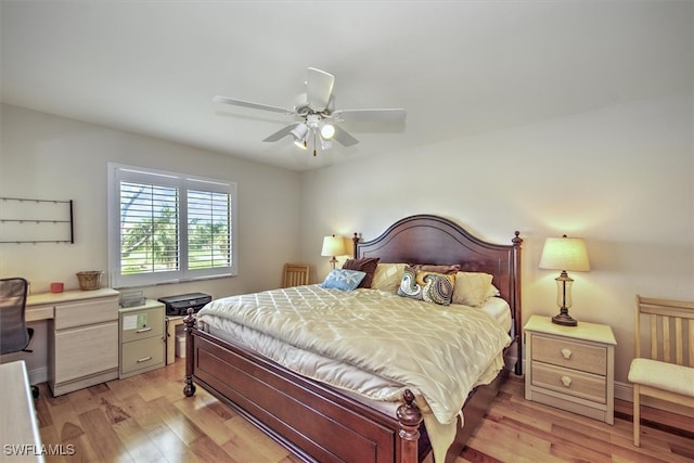 bedroom featuring ceiling fan and light hardwood / wood-style flooring