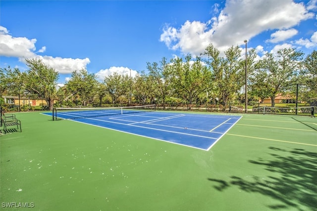 view of sport court featuring basketball court