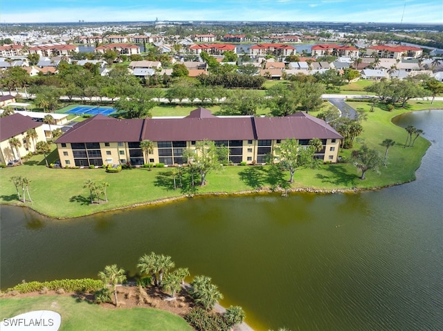 bird's eye view with a water view