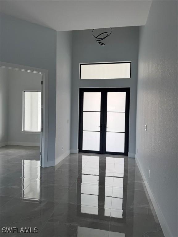 entrance foyer featuring french doors