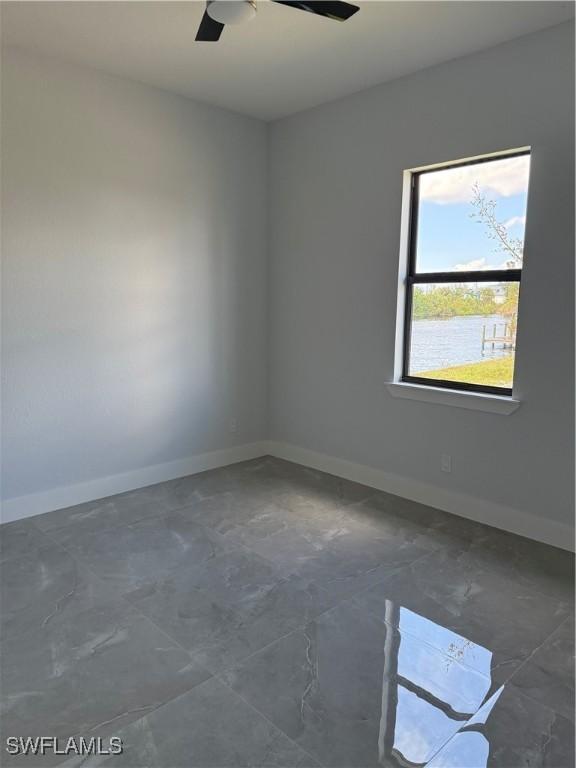 empty room with ceiling fan