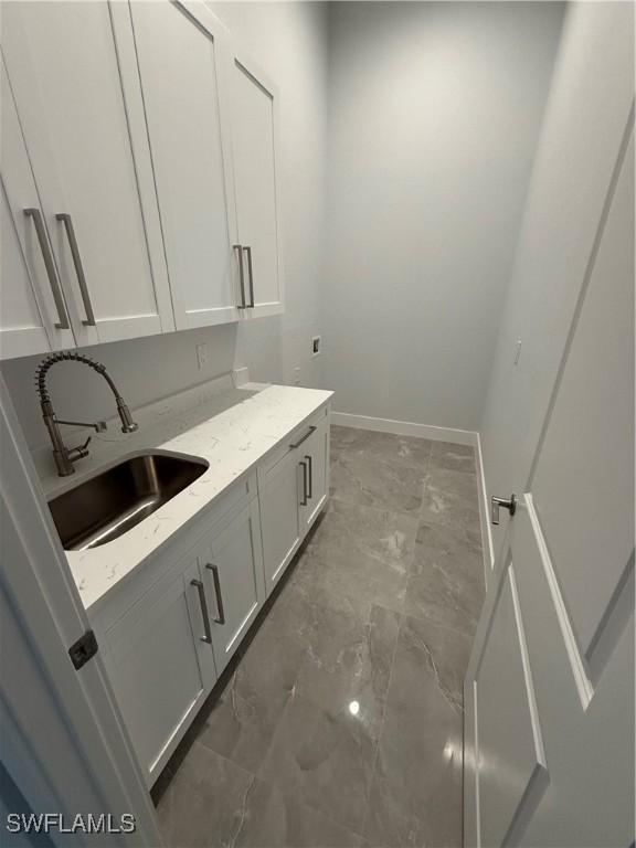 laundry room with sink