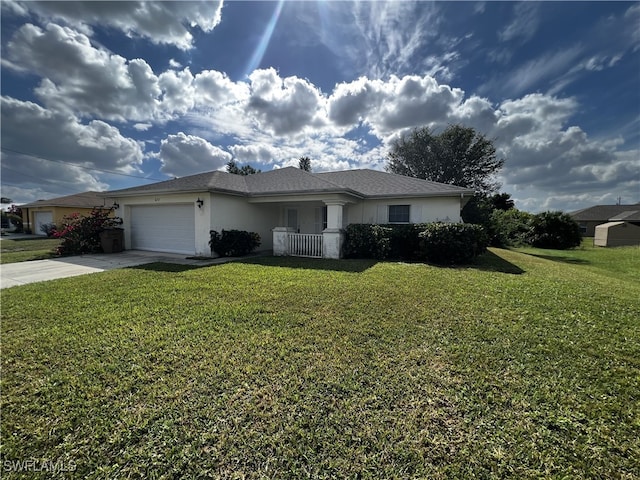 single story home featuring a garage and a front lawn