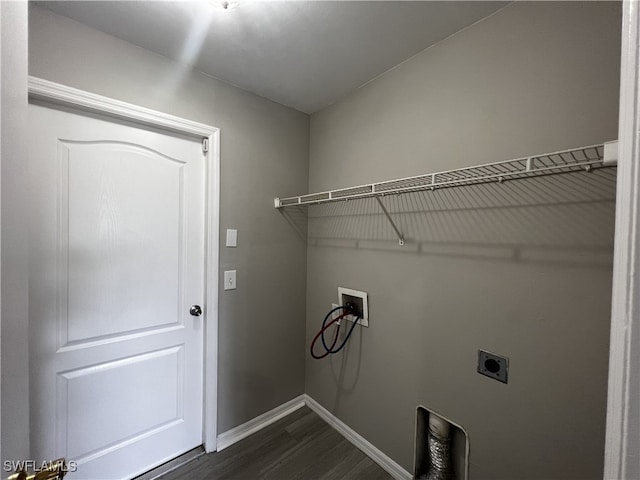 laundry room with dark wood-type flooring, hookup for a washing machine, and hookup for an electric dryer