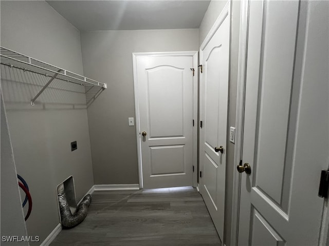 washroom featuring electric dryer hookup and hardwood / wood-style flooring