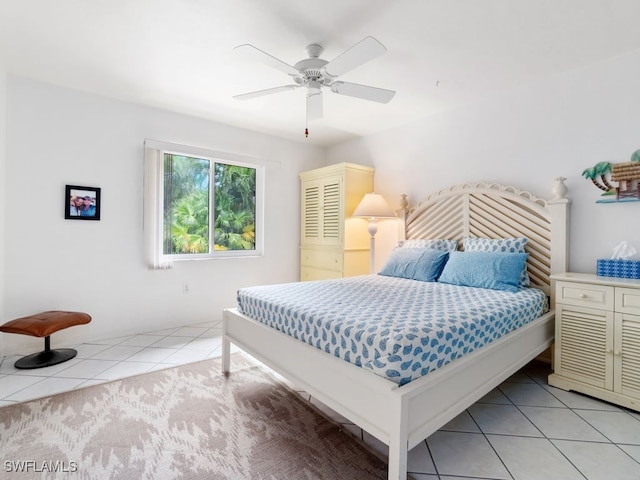 bedroom featuring ceiling fan and light tile patterned floors