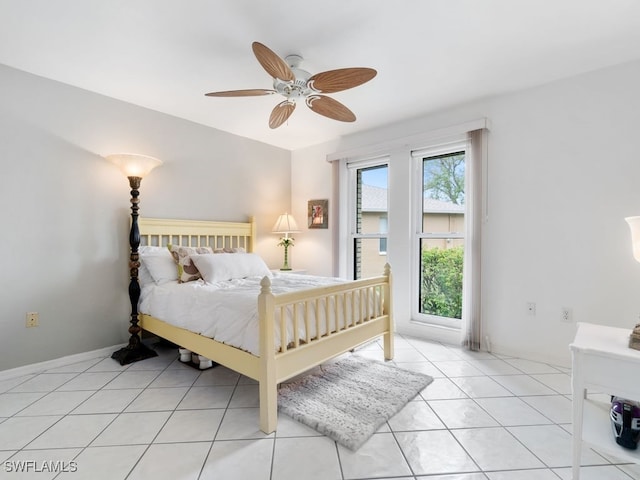 bedroom featuring ceiling fan and light tile patterned floors